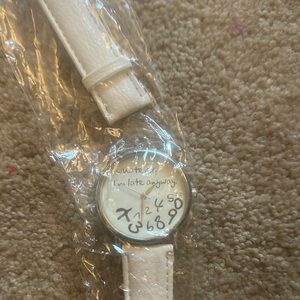 Elegant White Watch with Round Face and Leather Band